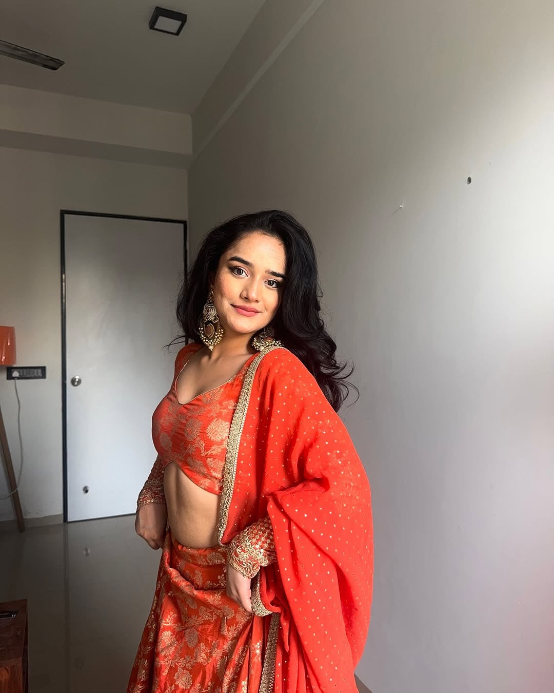 ORANGE COLOR PURE VISCOS BANARASI SILK WITH HEAVY THREAD AND SEQUENCE WORK LEHENGA CHOLI
