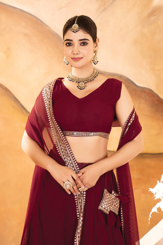 MAROON COLOR SEQUNCE ZARI EMBROIDERED GEORGETTE ATTRACTIVE BORDER LEHENGA CHOLI WITH DUPATTA